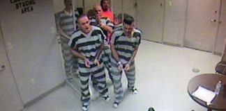 Prisoners are released to SAVE the life of an armed guard who suffered a heart attack