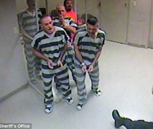Prisoners are released to SAVE the life of an armed guard who suffered a heart attack