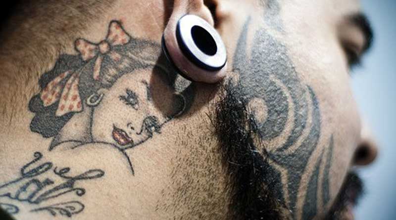 Tattoos and piercings : ancestral fashion