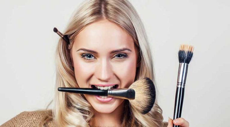 Why is it necessary to wash your makeup brushes often?